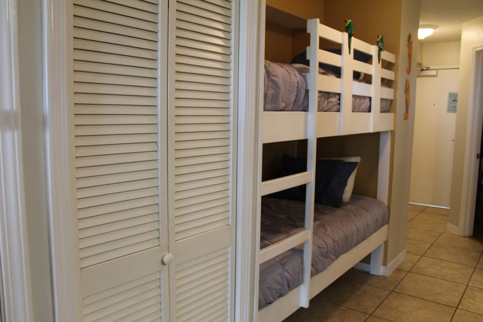 Twin size beds in hall bunk