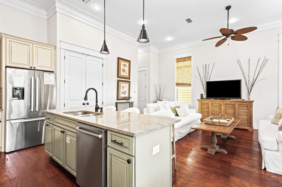 Kitchen opens into the living room for easy entertaining and conversation.