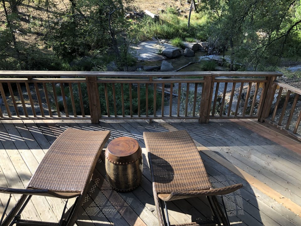 Lounge chairs overlooking Lewis Creek