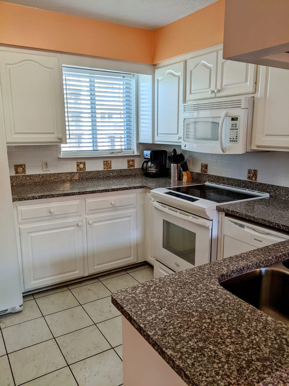 fully equipped kitchen with coffee maker