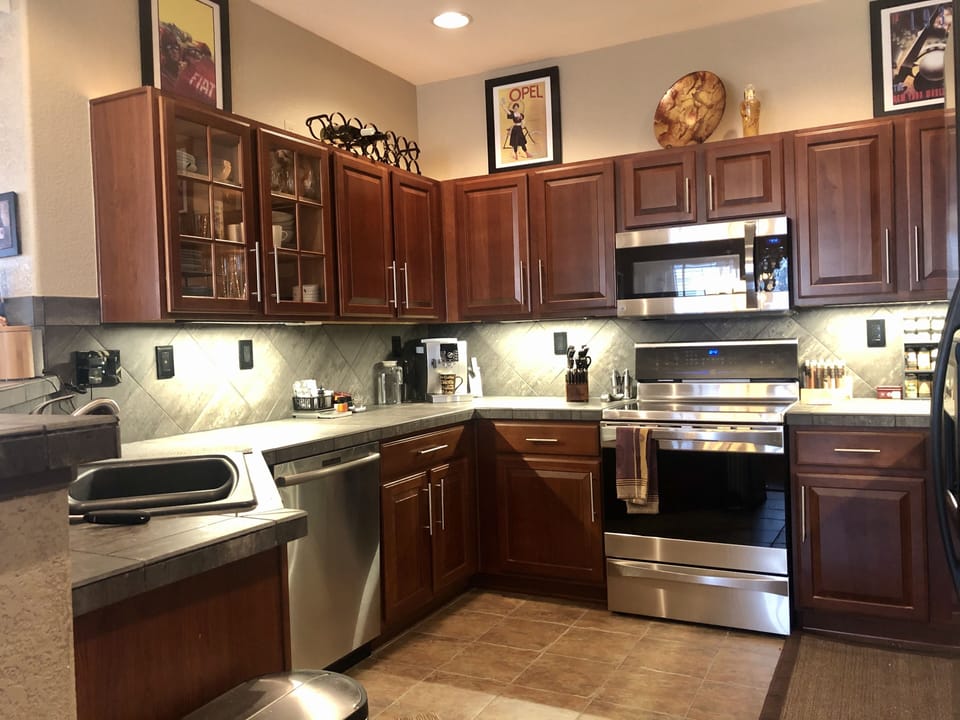 Upgraded stainless appliances. Silent washer. Induction stove. Espresso machines