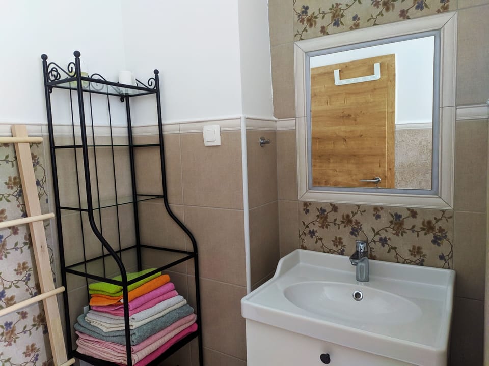 Bathroom. Every guest gets two towels (big and medium). 