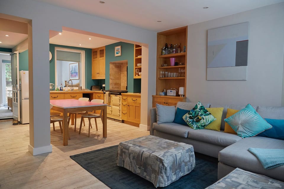 Open plan sitting room and kitchen 