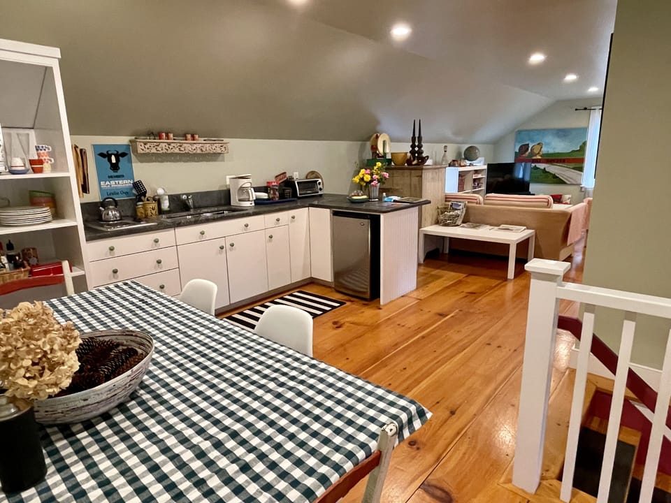 Kitchen with view towards lounge area