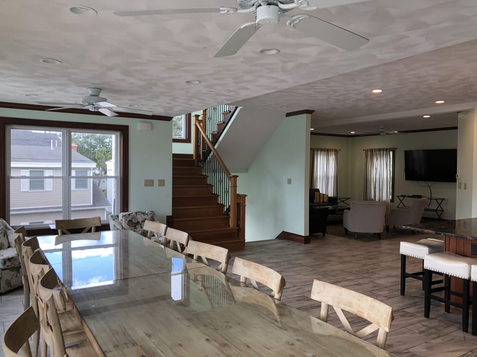 large second floor open concept kitchen/dining/living room