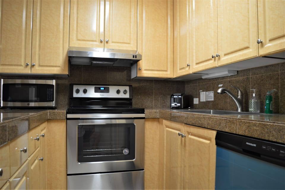 New stainless steel appliances, granite countertop, toaster, blender,  and more