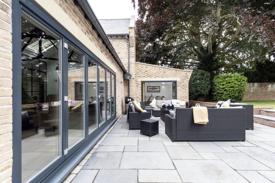 Terrace looking towards the conservatory beside the large open plan living area