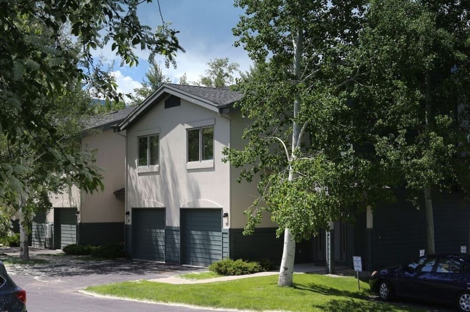 Front of home - end unit with attached garage