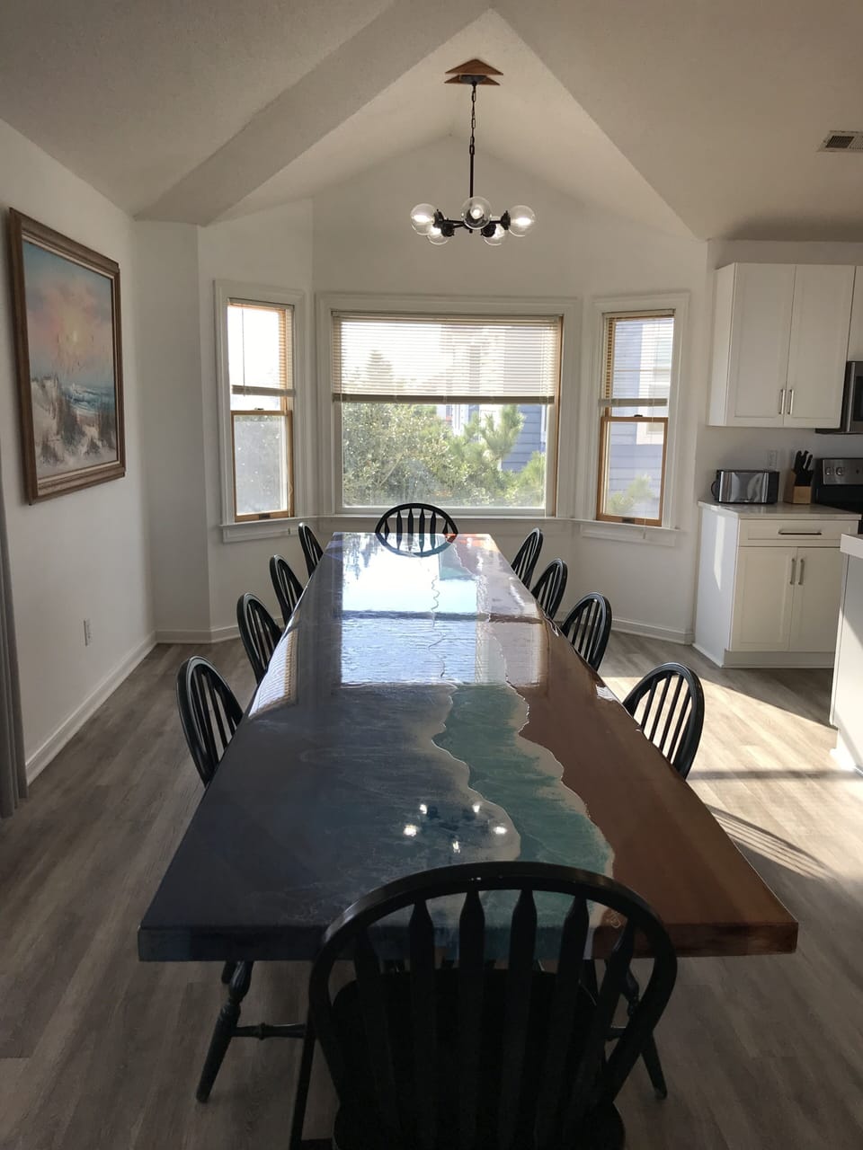 Extra chairs are at the home - table can seat 16+