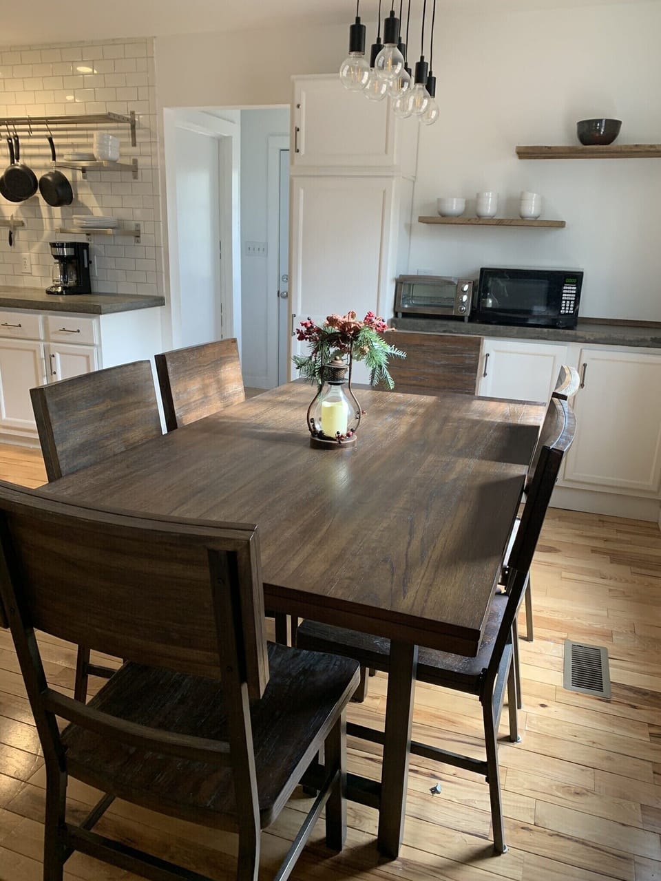 Kitchen table seats 6 and 2 additional seats at island