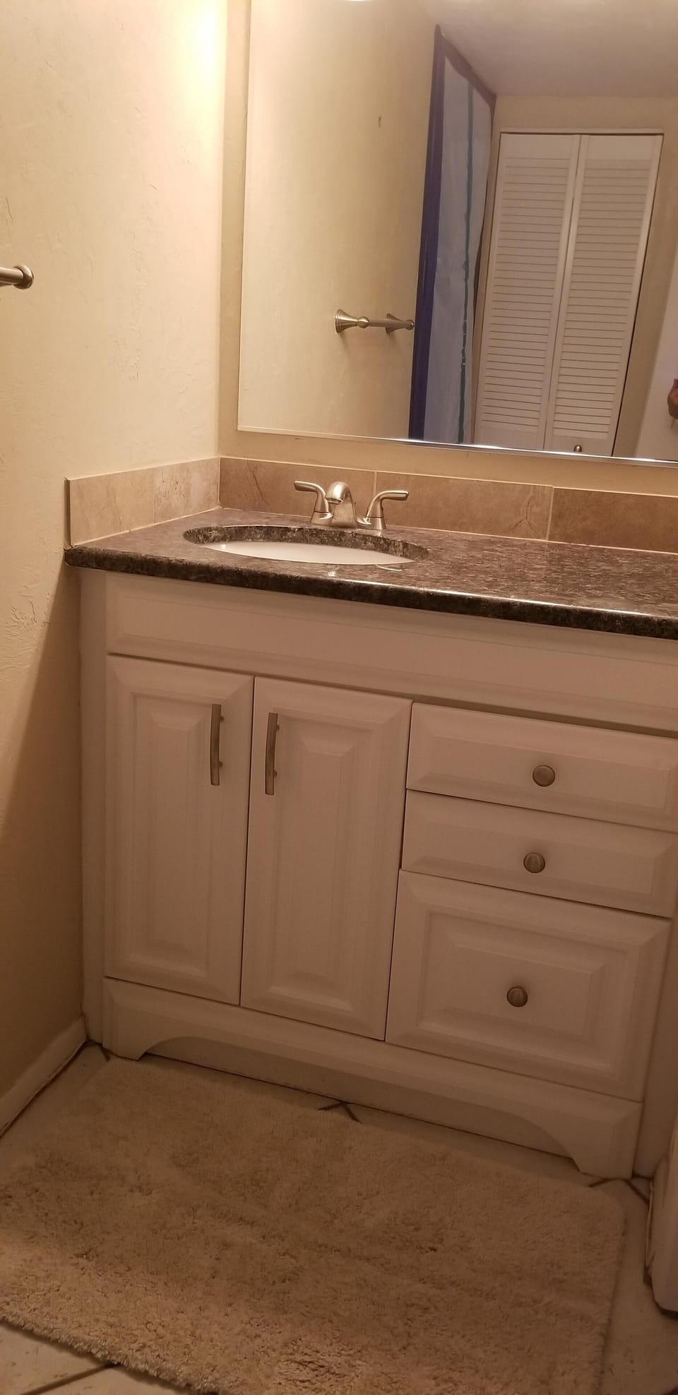 Vanity sink next to master bedroom