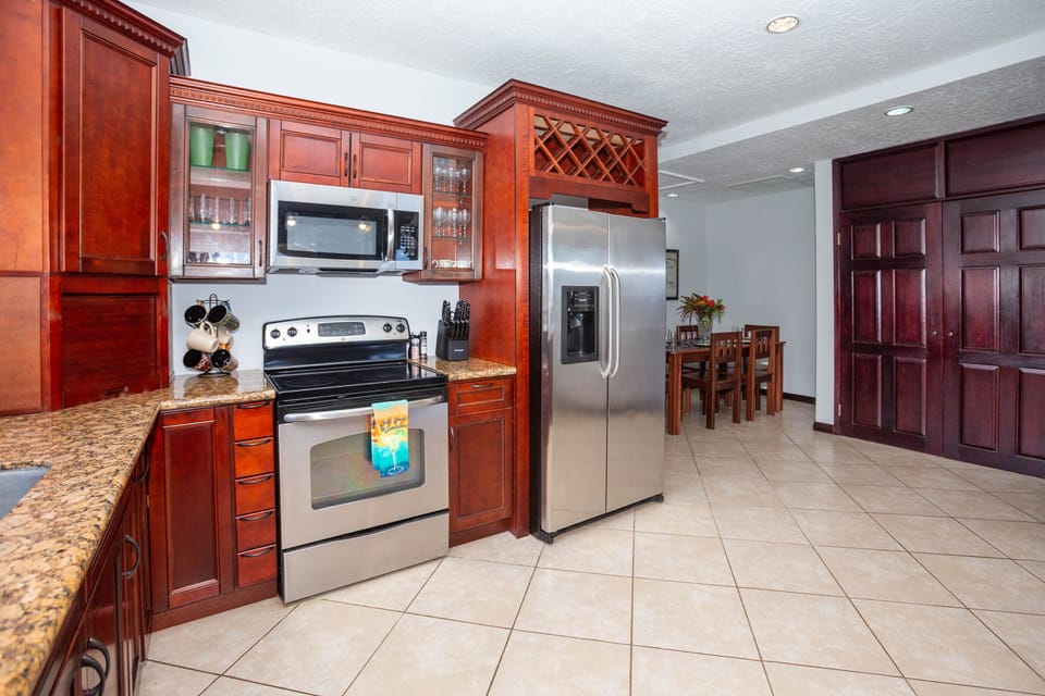 The kitchen is stocked with modern appliances