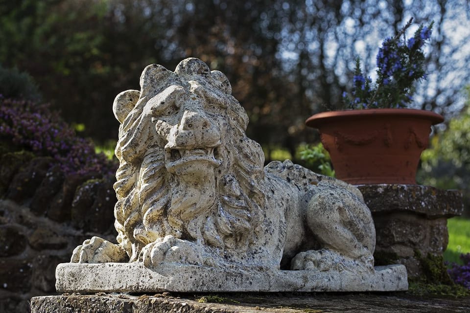 Lion in the courtyard at Heath Farm Holiday Cottages