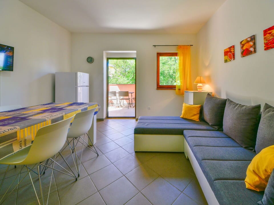 Furniture, Table, Picture Frame, Interior Design, Orange, Lighting, Architecture, Comfort, Floor, Flooring
