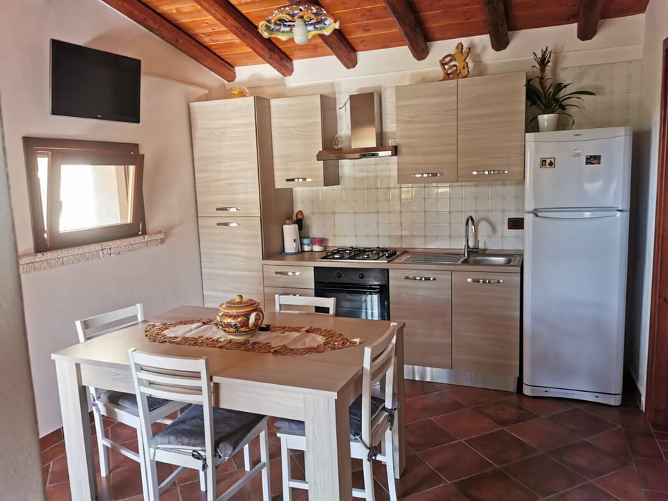 Alcamo Marina, kitchen with tv