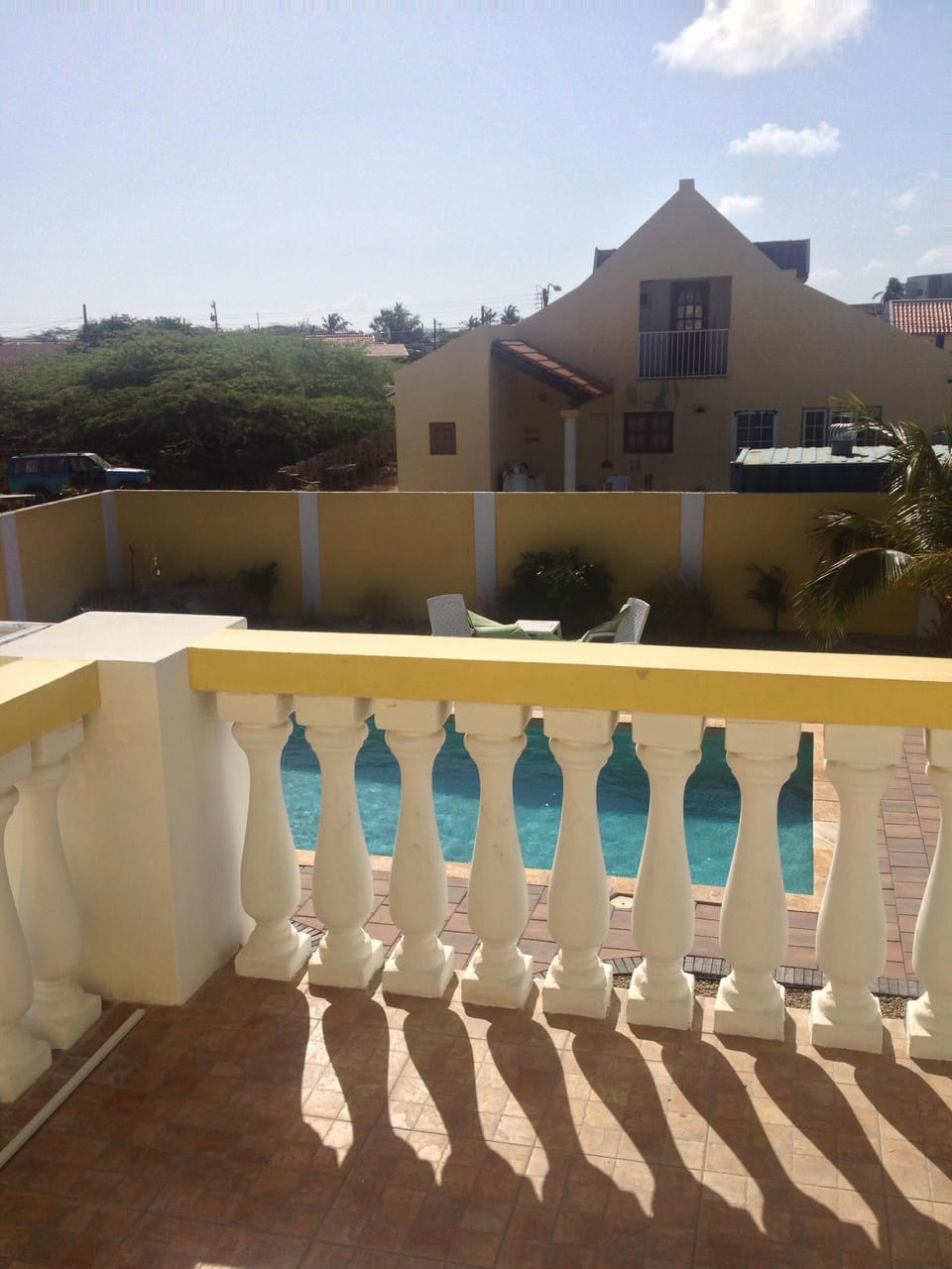 Back patio overlooking pool