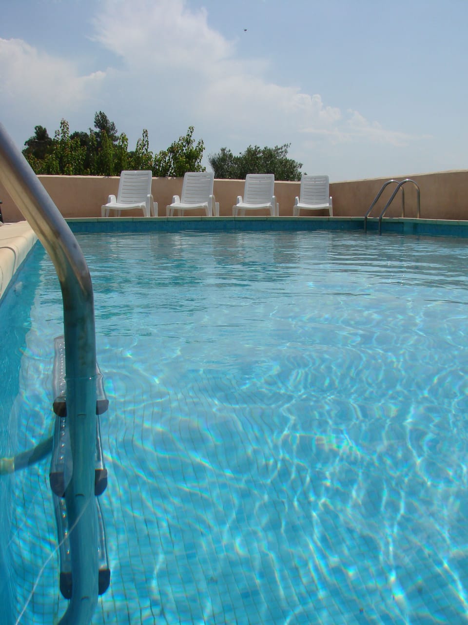 Pool with sun beds