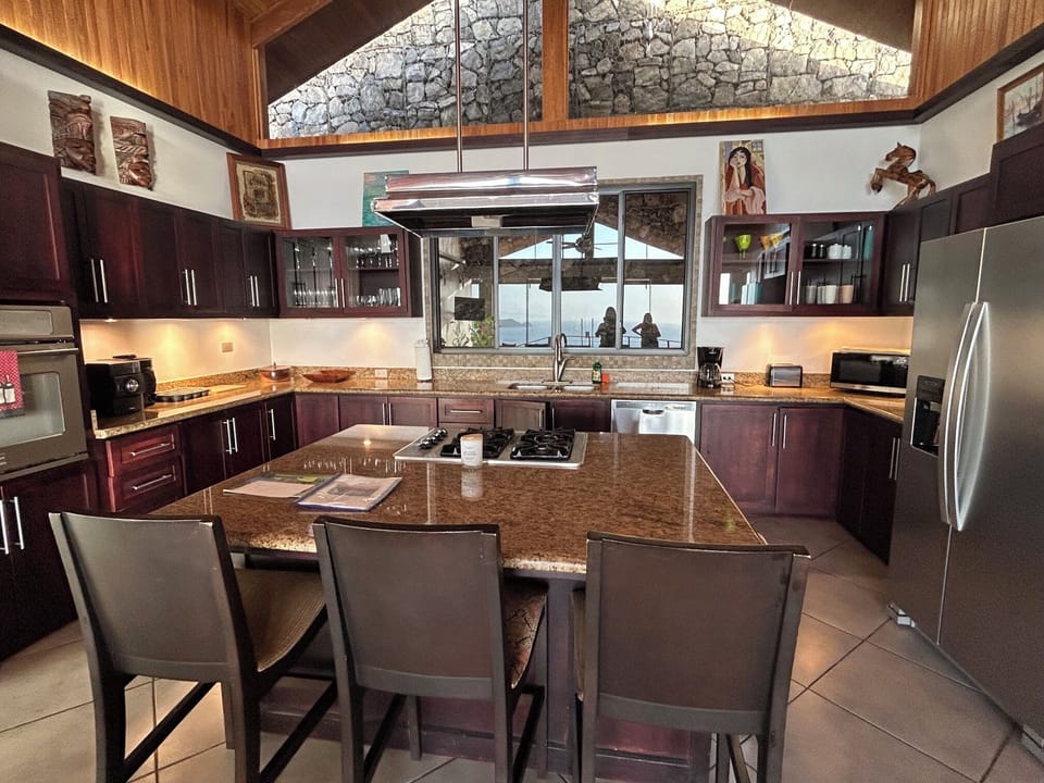 Beautiful custom kitchen with granite countertops and island