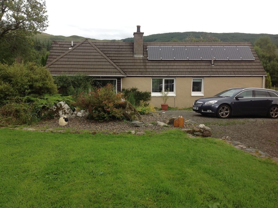 Cottage has solar panels for energy.