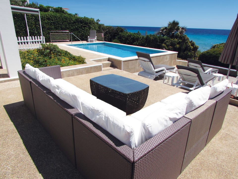 Outdoor seating and BBQ area.