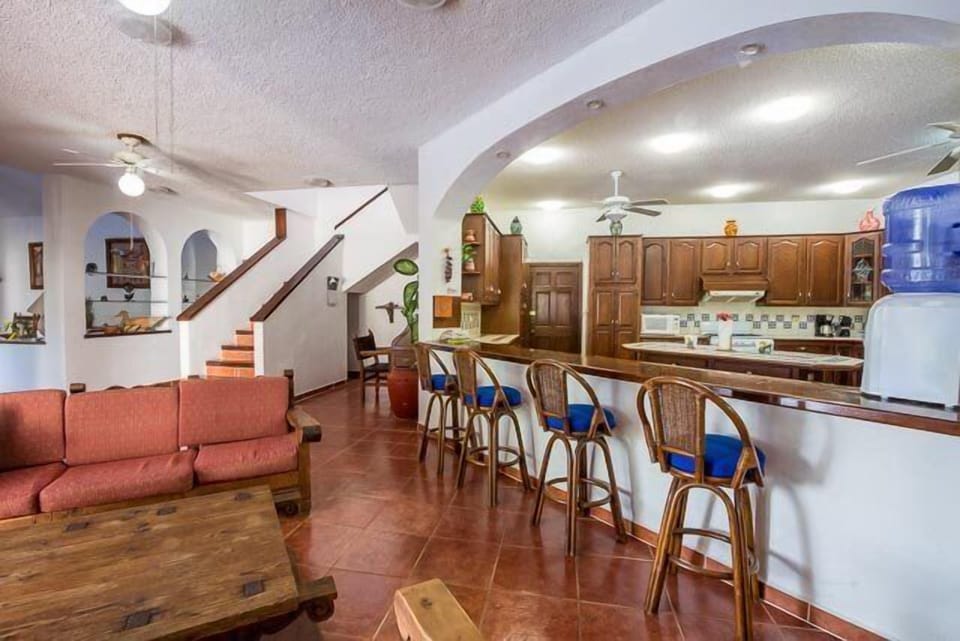 Spacious living/ kitchen area. Kitchen has breakfast counter