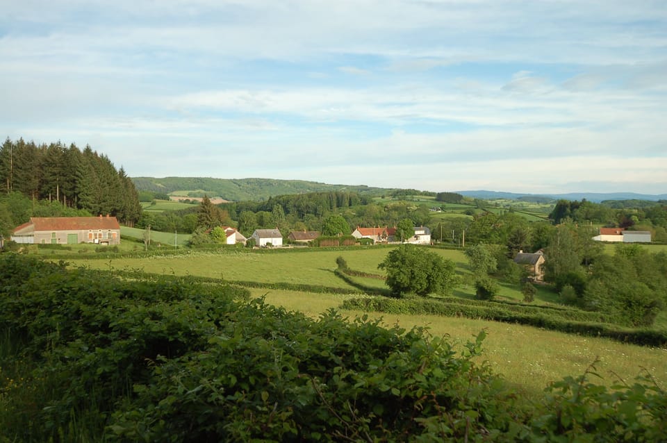 La Maison Rose from the forest trail.