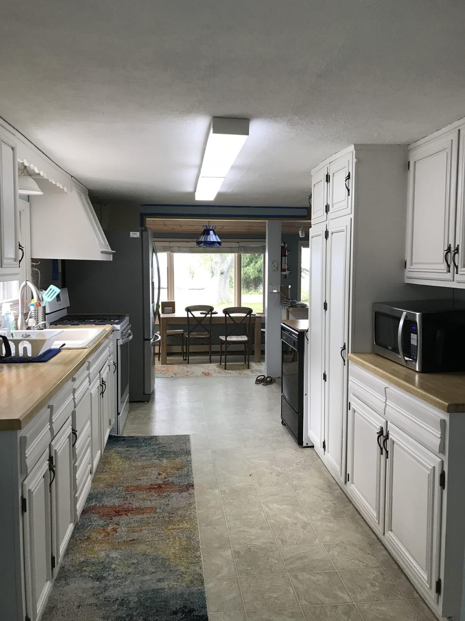 Galley style kitchen with everything you need to make a great meal.