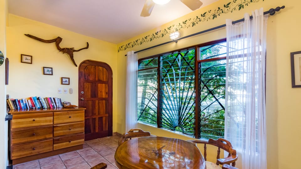 Indoor dining area with an ocean and 2 rivers view.