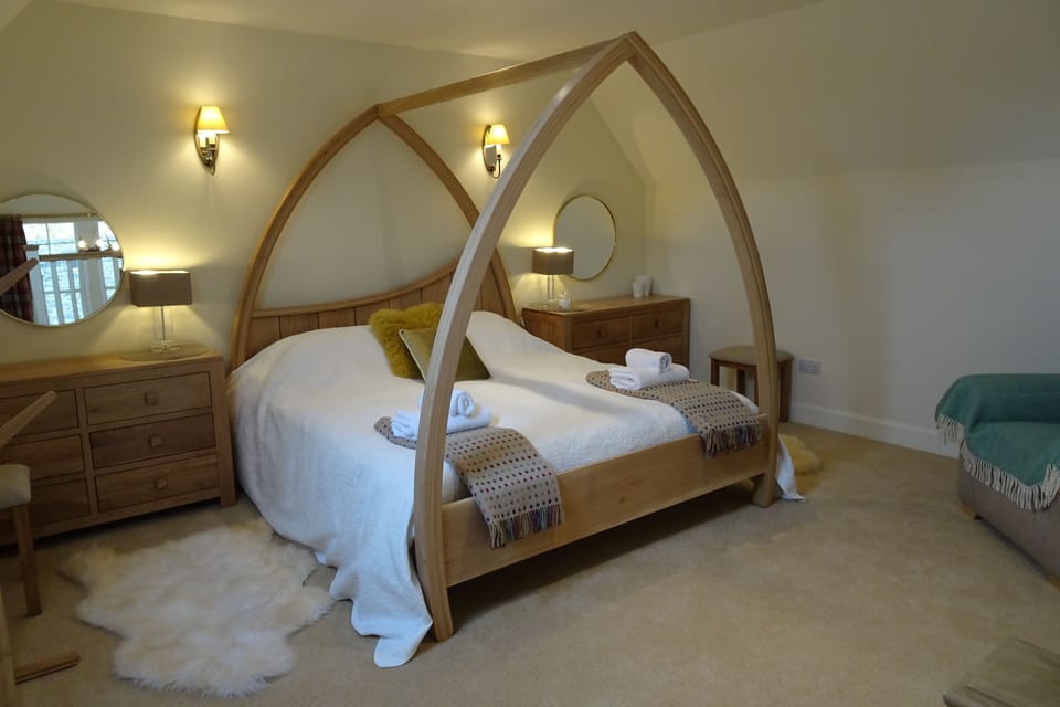 School Room hand made oak four poster super-king bed.