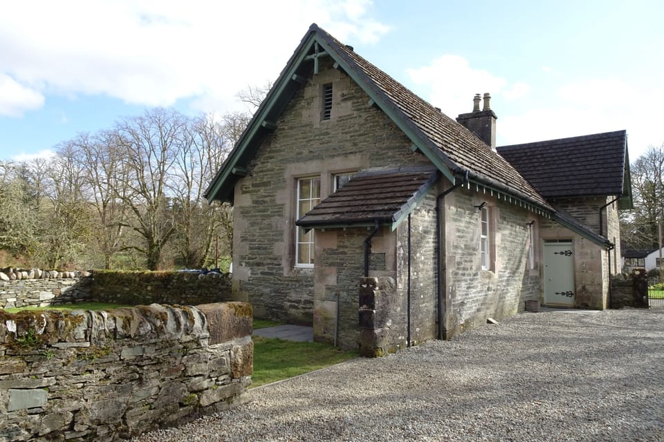 The School Room with gravelled court yard and lawned wall garden
