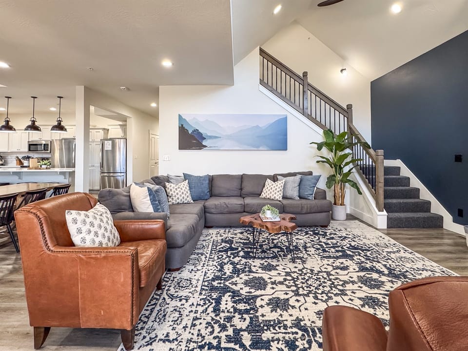 Right off the living room is stairs to the upper level