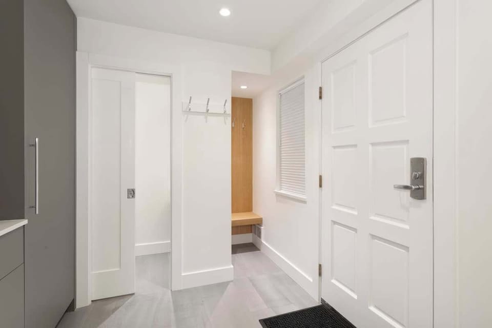 - Entryway with built-in bench and coat hooks for easy gear storage  
- Modern mountain design with bright, organized layout throughout  
- Convenient mudroom perfect for ski boots and winter wear essentials  