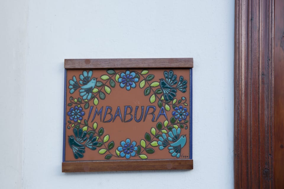Handcrafted ceramic plaque by Ecuadorian artist, and personalized with apt. name