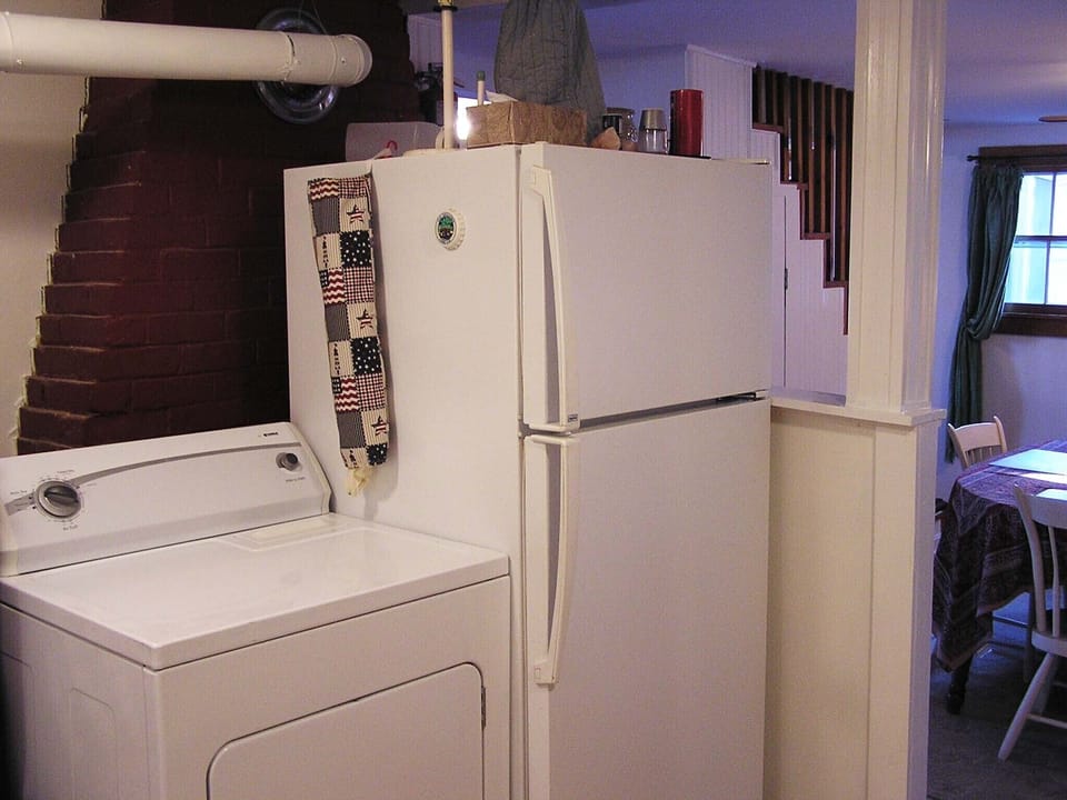 View of Refrigerator and Dryer