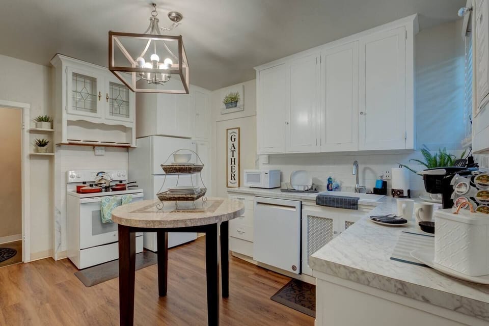 Open and bright, the kitchen provides everything you'll need to whip up a tasty meal.#stayrenostonehouse