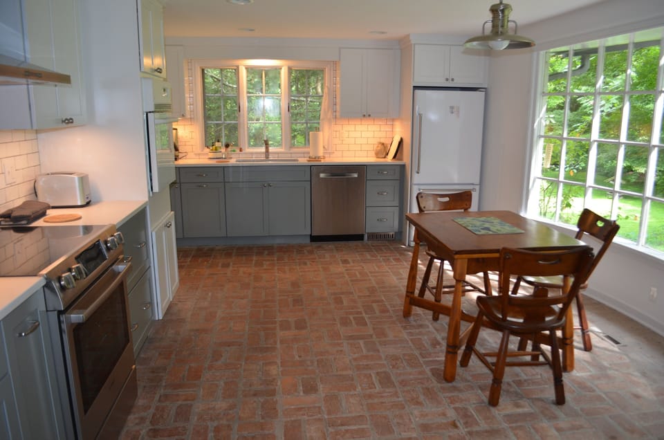 Kitchen features two ovens, one an induction Bosch. 
