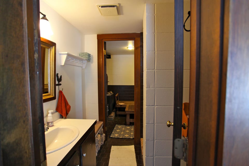 Bathroom off Living Room with Woodfired Sauna