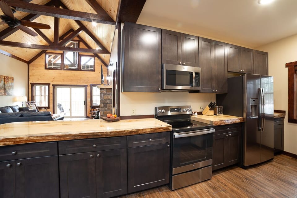 Kitchen Area , note : 4 inch thick live edge counter/ bar top.