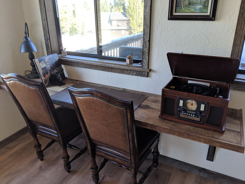 Record player with a few classic records to play.  