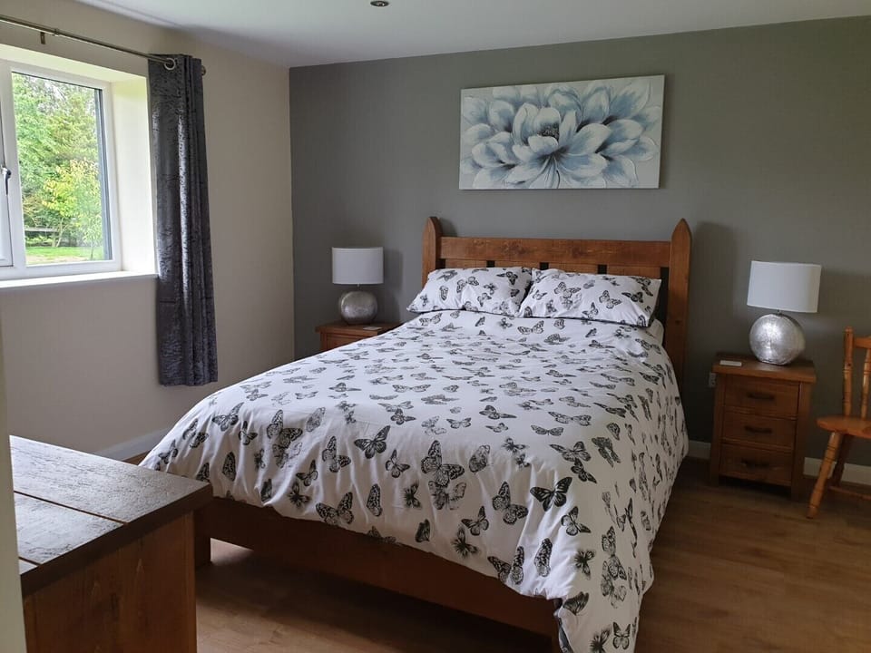 Bed room of The Swallows Nest at Windy Ridge, New Delights