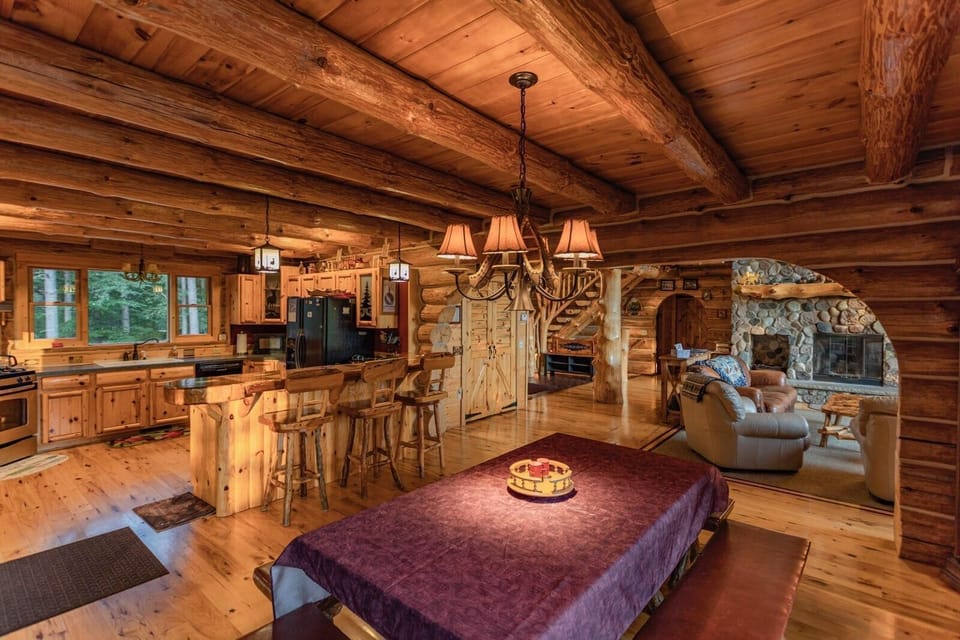 Kitchen opens up to dining and living rooms, keeping chefs involved w/ the group