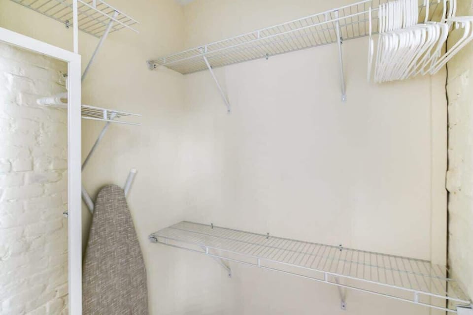 Clothing closet w/iron & board