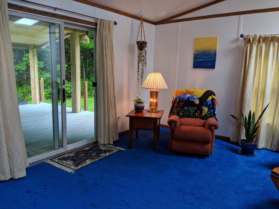 Living room with sliding doors to back deck