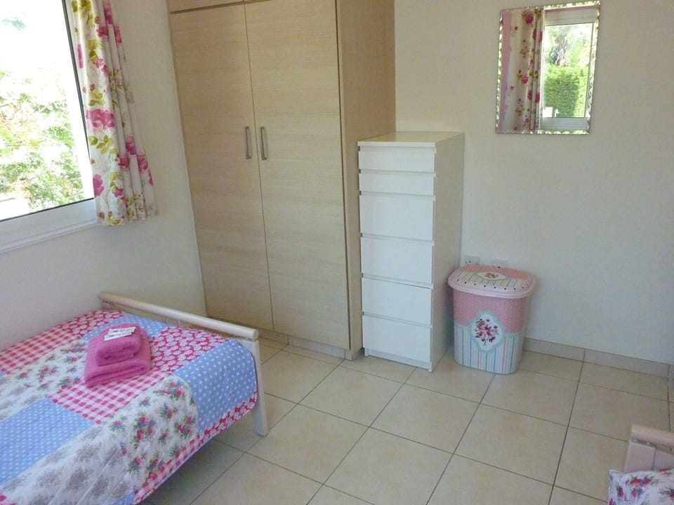 Bedroom 2 with ample wardrobe and drawer space