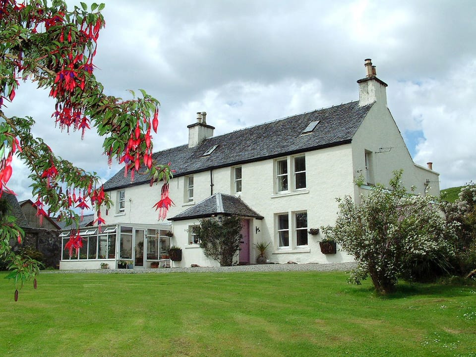 Aros Mains House. The Apartment is the whole top floor.