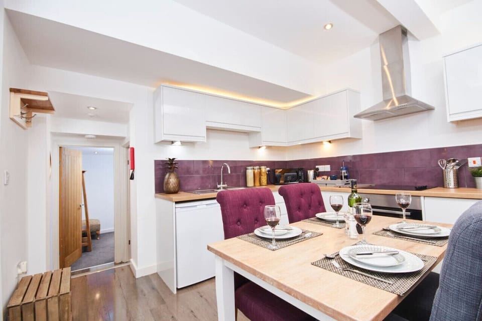 Spacious kitchen, dining space with ample storage