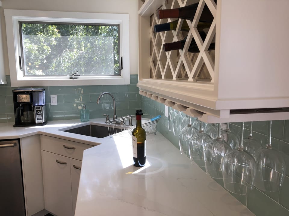 Wine and wine glass storage in kitchen