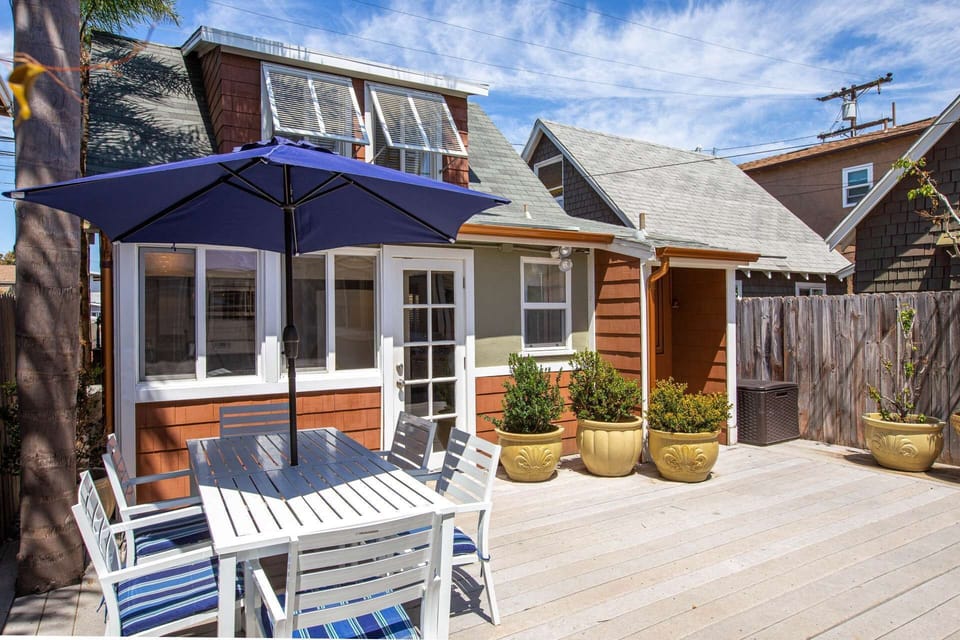 The back cottage has it's own private entry from the central patio.