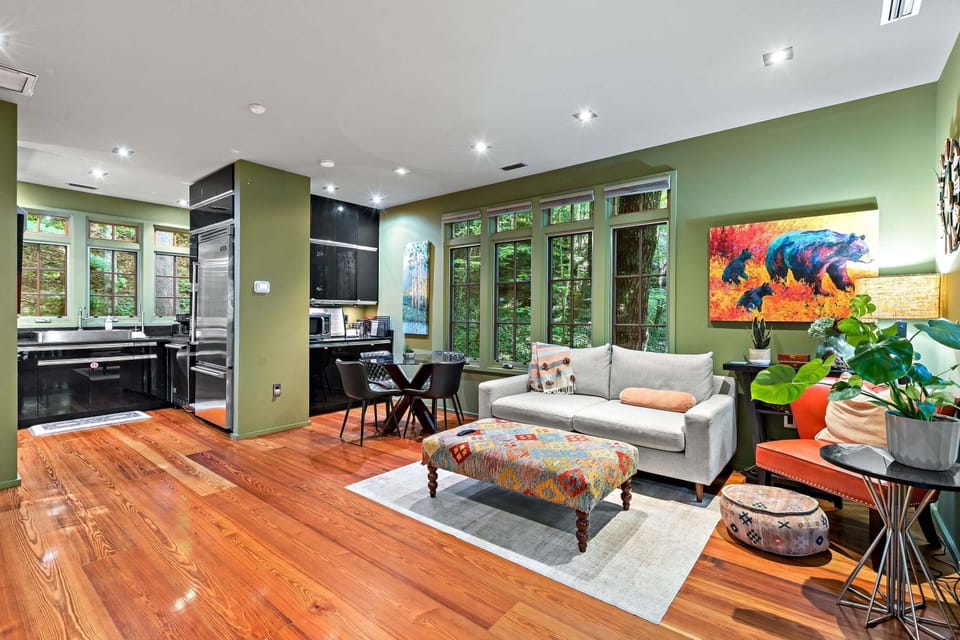 Open-concept living, kitchen, and dining areas.