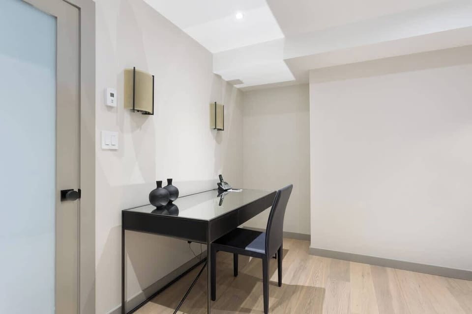 - Quiet workspace with modern desk and soft lighting design  
- Ideal for remote work or planning mountain activities ahead  
- Calm, minimal setup to focus and stay productive during your stay  